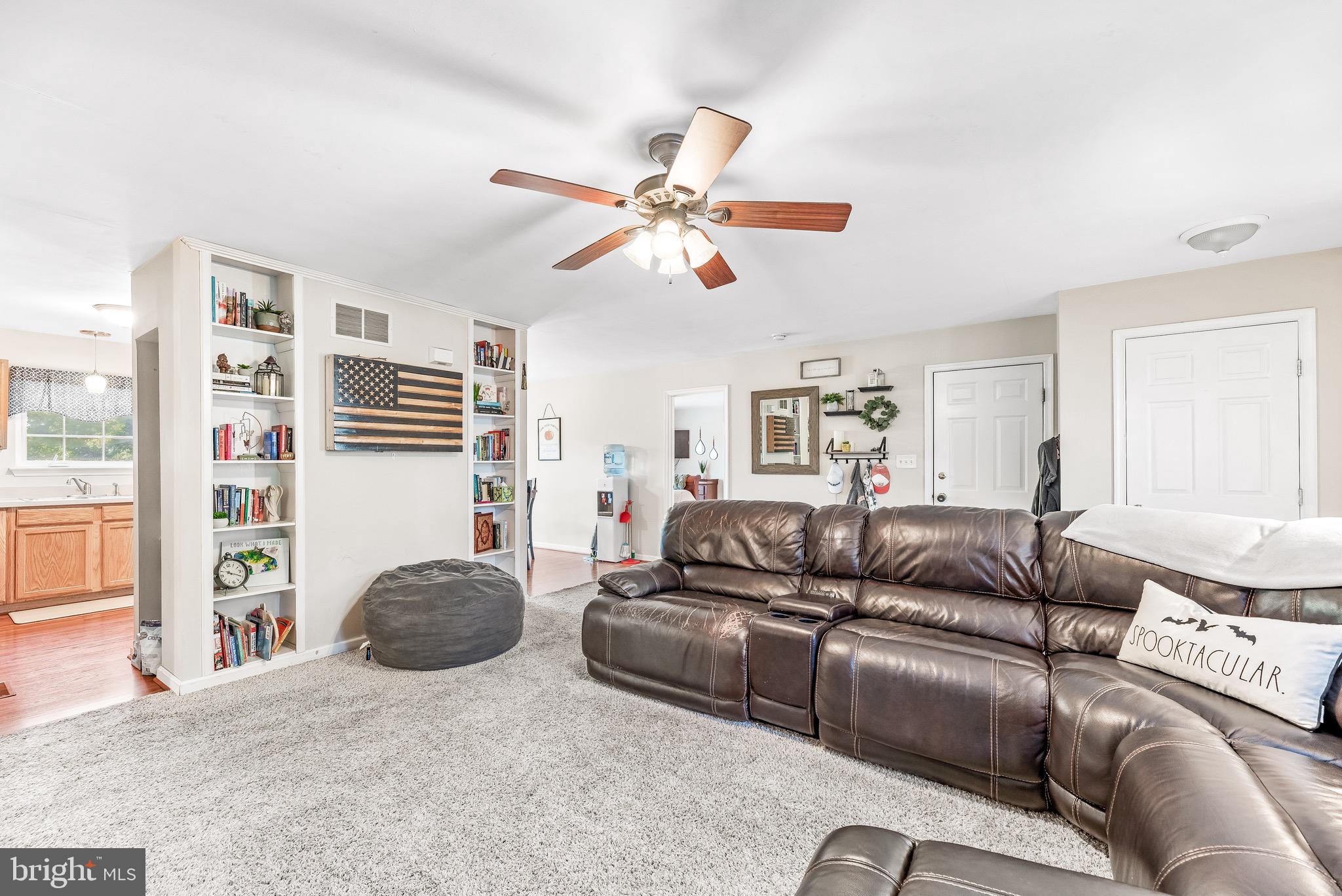 11156 Rawhide Road Lusby, MD 20657 - Photo 13 of 33 a living room with furniture and a window