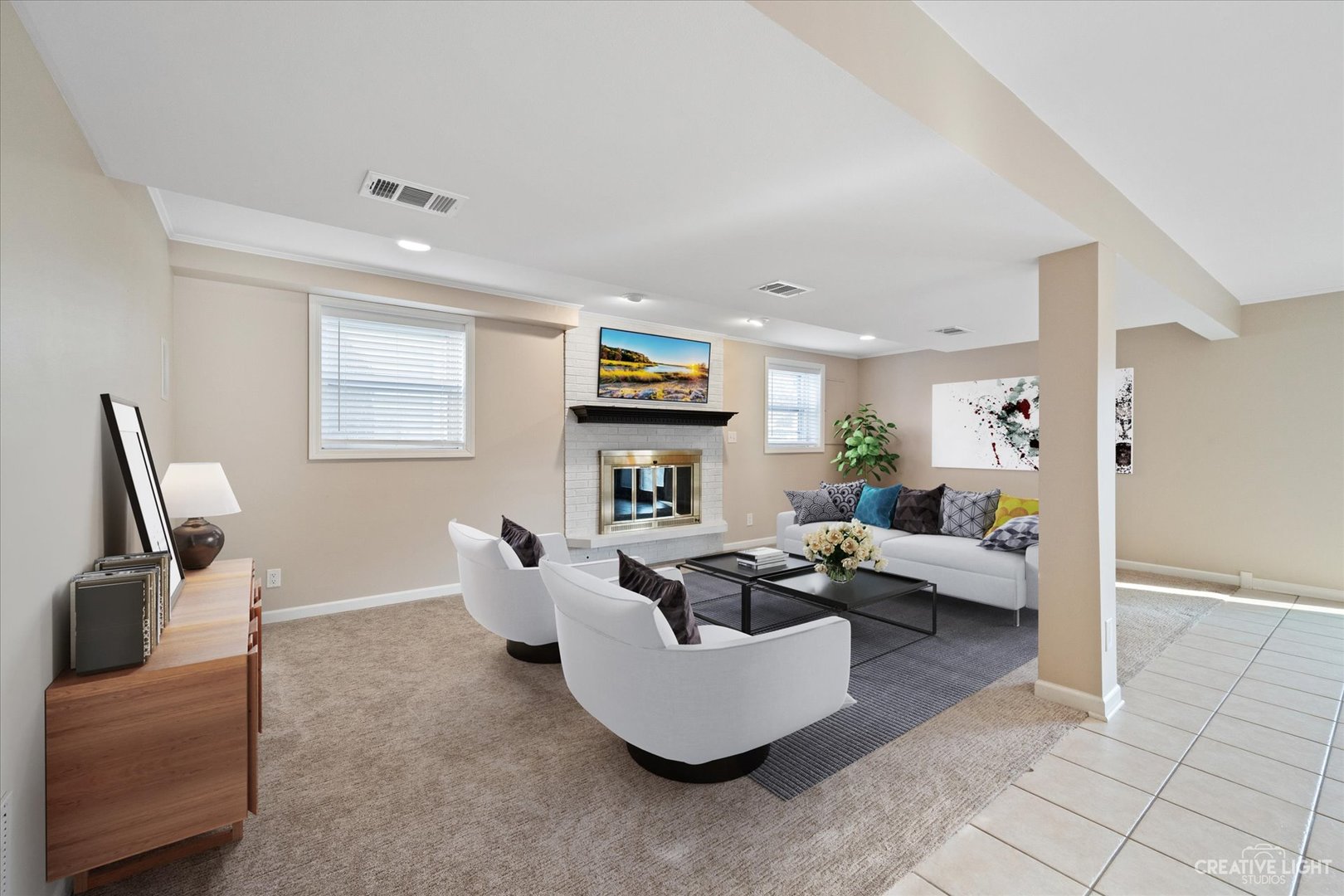 1925 Briarcliffe Boulevard Wheaton, IL 60189 - Photo 13 of 21 a living room with furniture and a fireplace