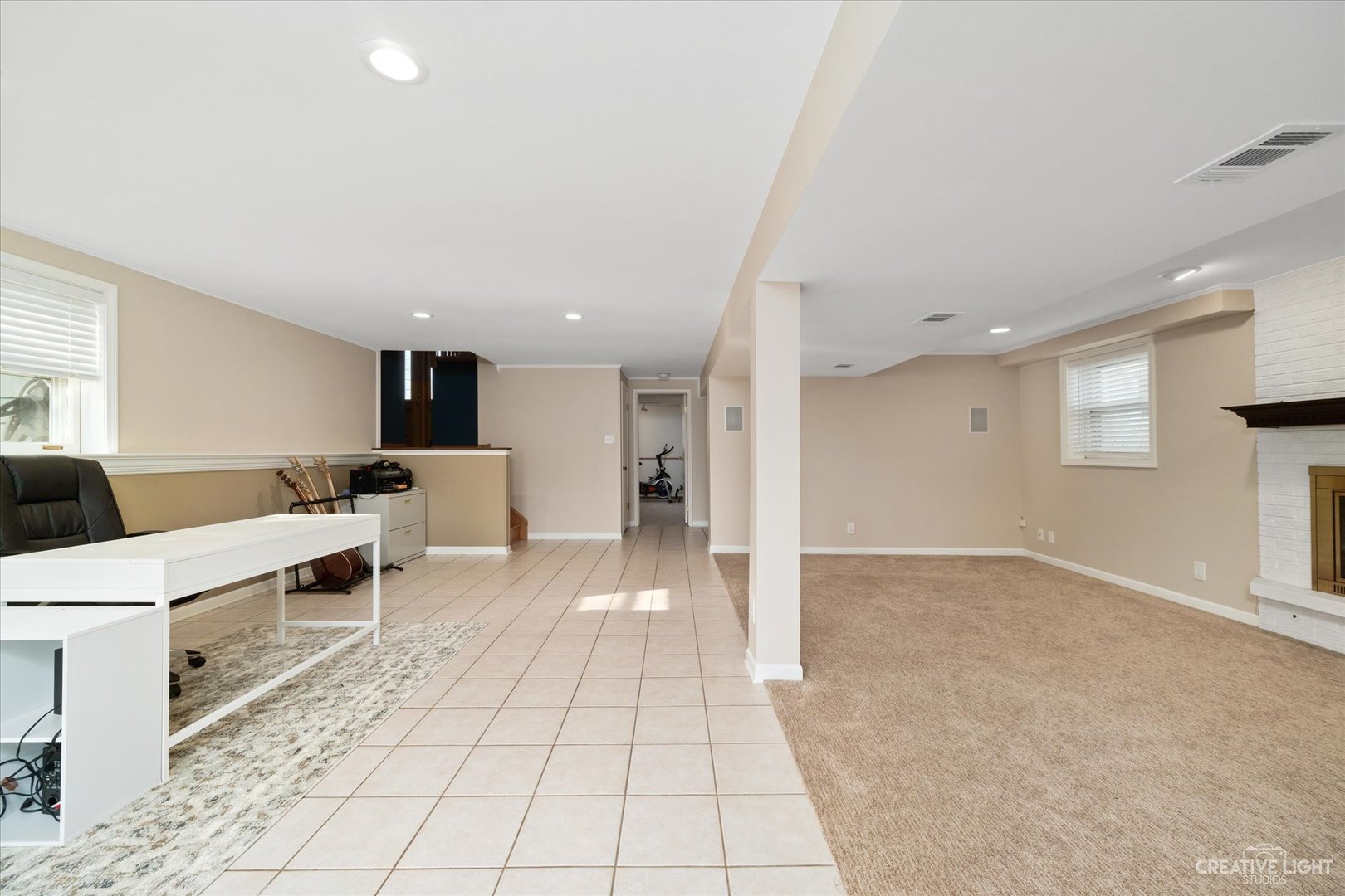 1925 Briarcliffe Boulevard Wheaton, IL 60189 - Photo 16 of 21 a living room with furniture and a table