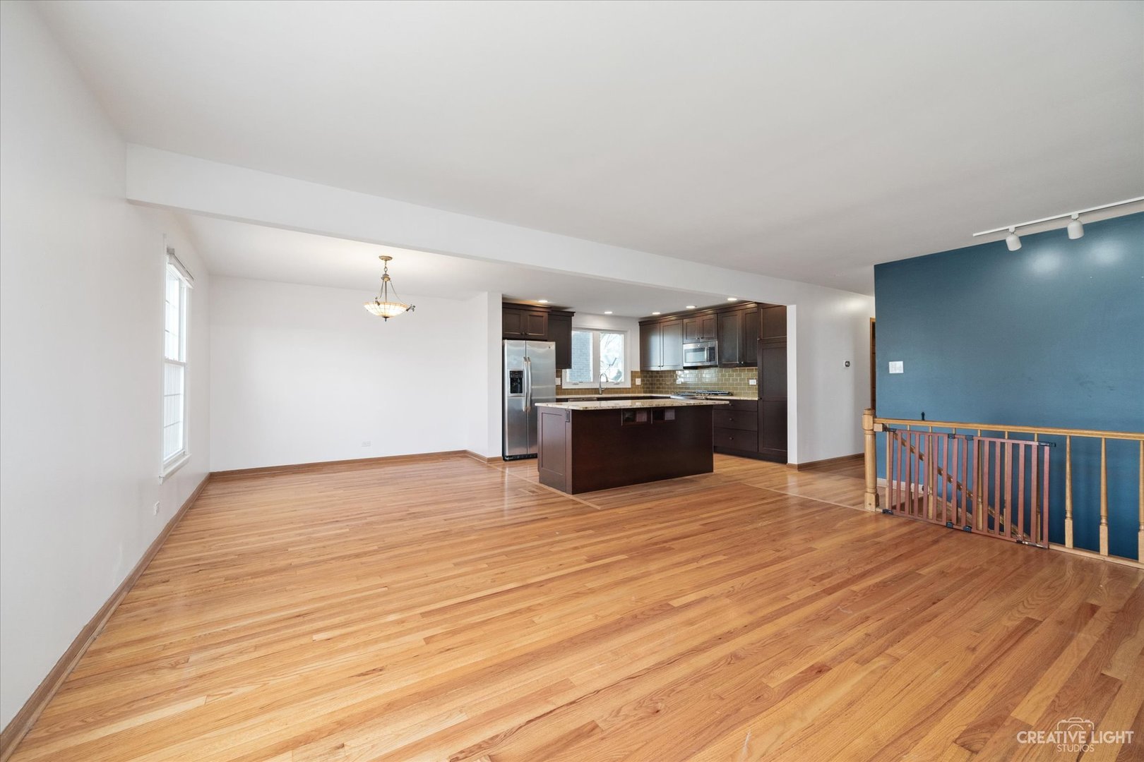 1925 Briarcliffe Boulevard Wheaton, IL 60189 - Photo 4 of 21 a view of kitchen and kitchen with furniture wooden floor and window