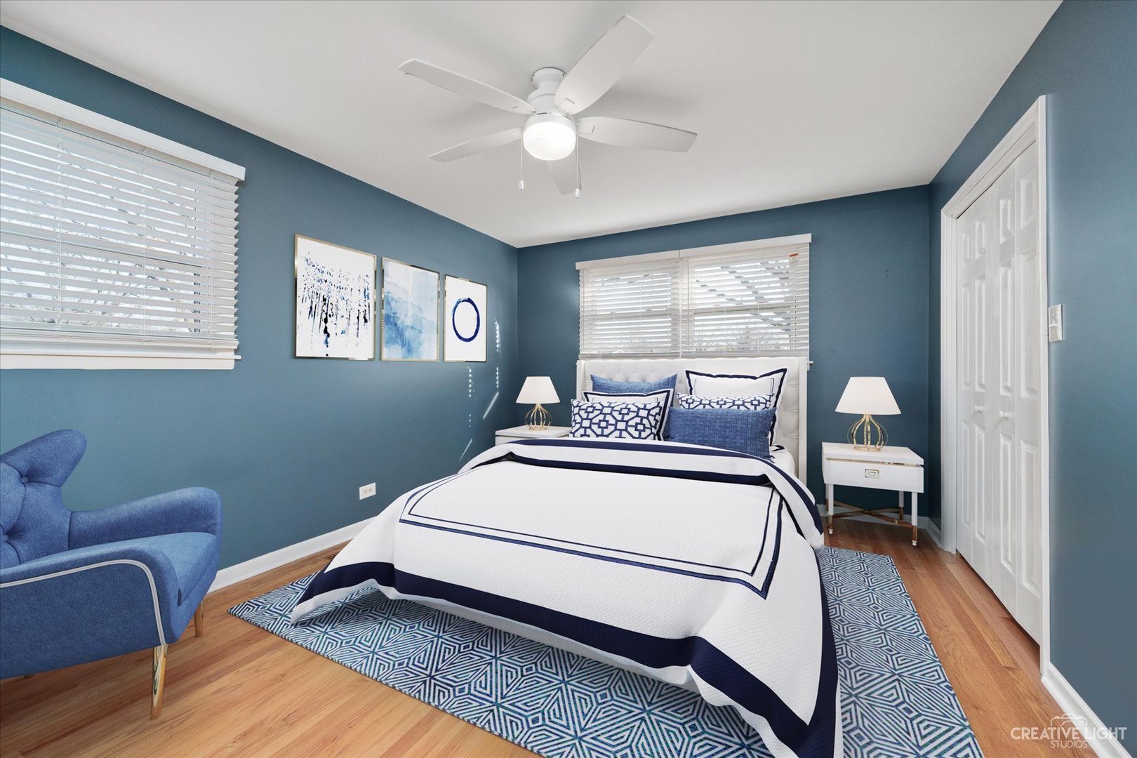 1925 Briarcliffe Boulevard Wheaton, IL 60189 - Photo 7 of 21 a bed room with a bed and a couch