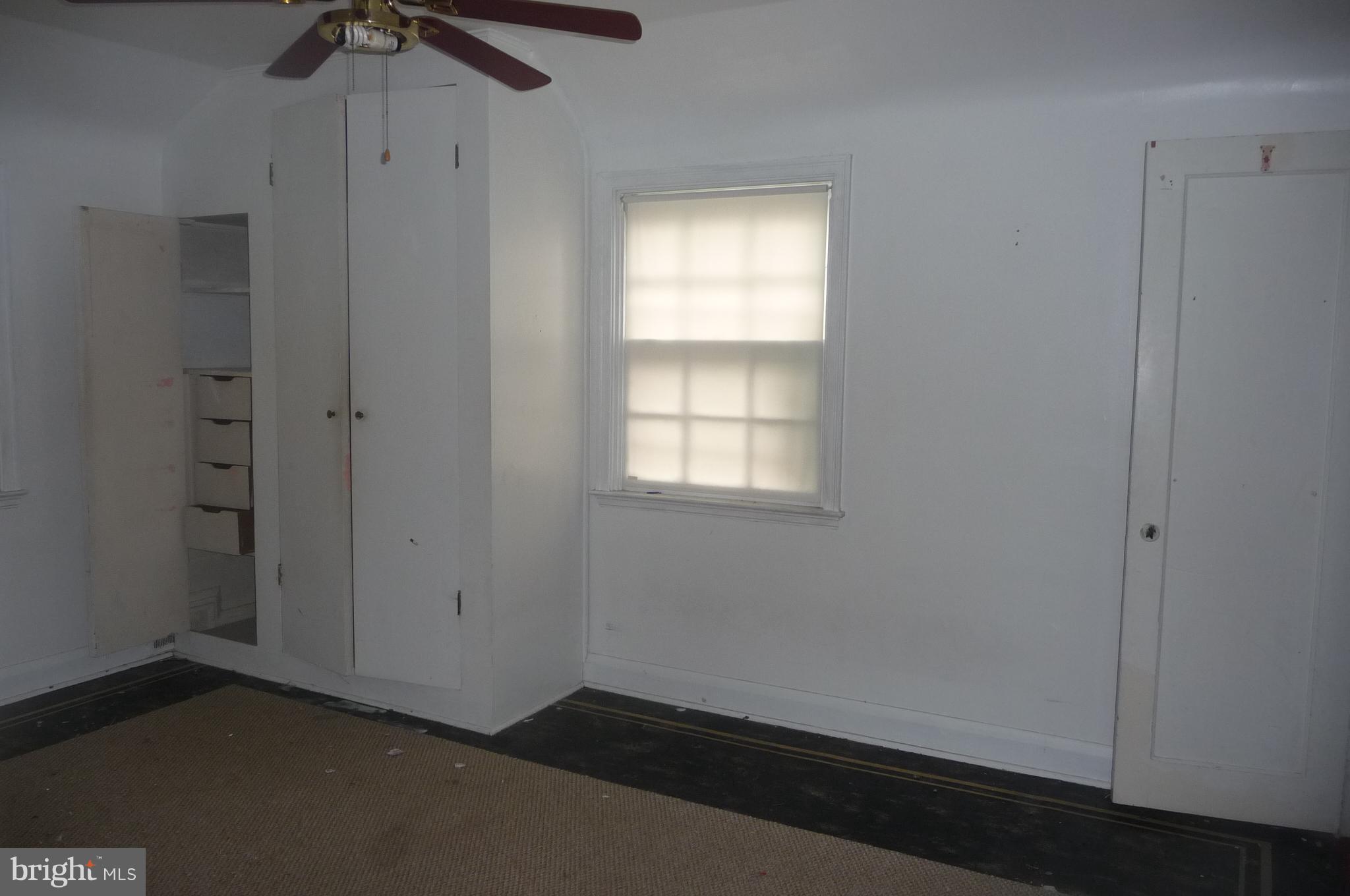 3924 Clarinth Road Baltimore, MD 21215 - Photo 14 of 15 an empty room with a window