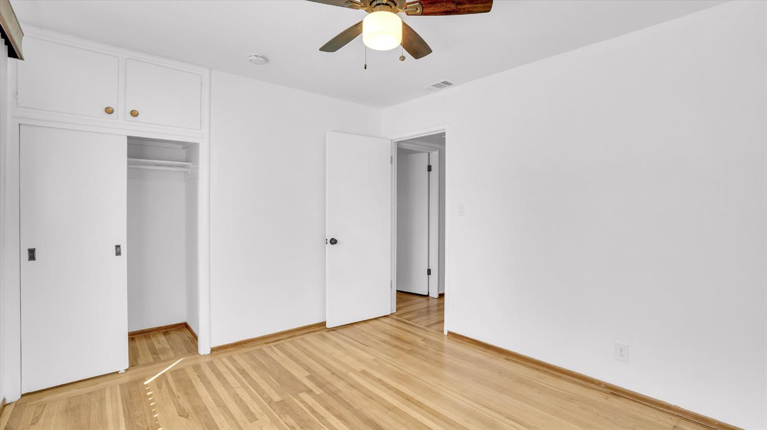 3543 Tarro Way Carmichael, CA 95608 - Photo 18 of 42 a view of an empty room with wooden floor