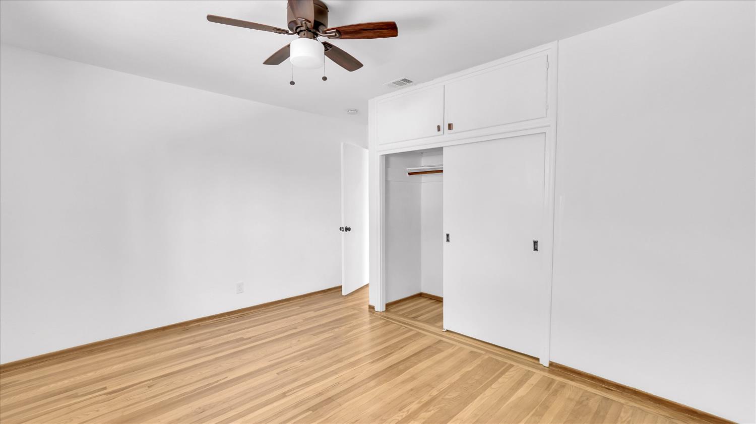 3543 Tarro Way Carmichael, CA 95608 - Photo 22 of 42 a view of empty room with wooden floor