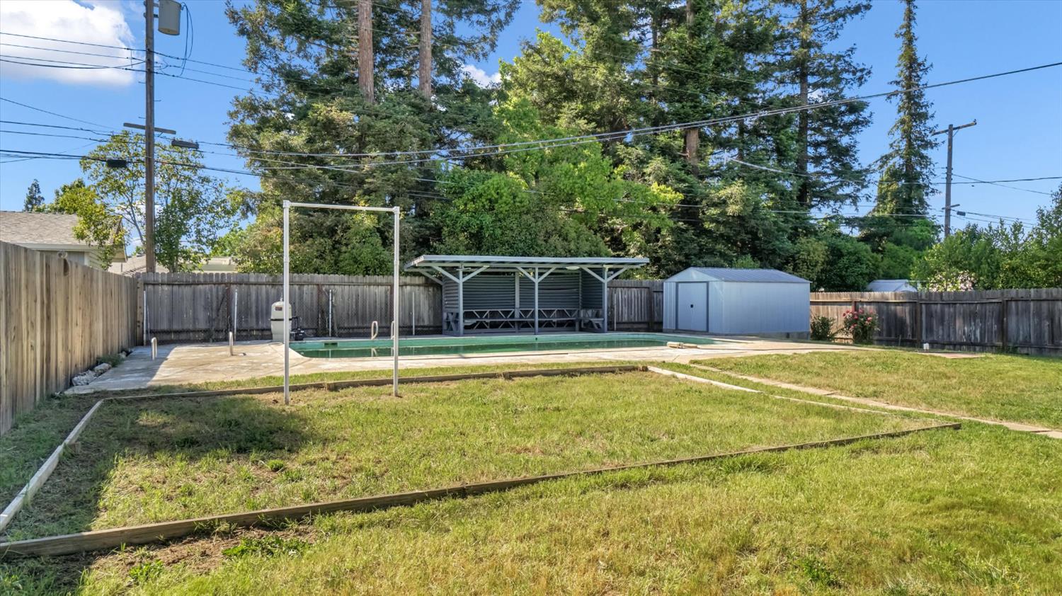 3543 Tarro Way Carmichael, CA 95608 - Photo 28 of 42 a swimming pool with some trees in the background