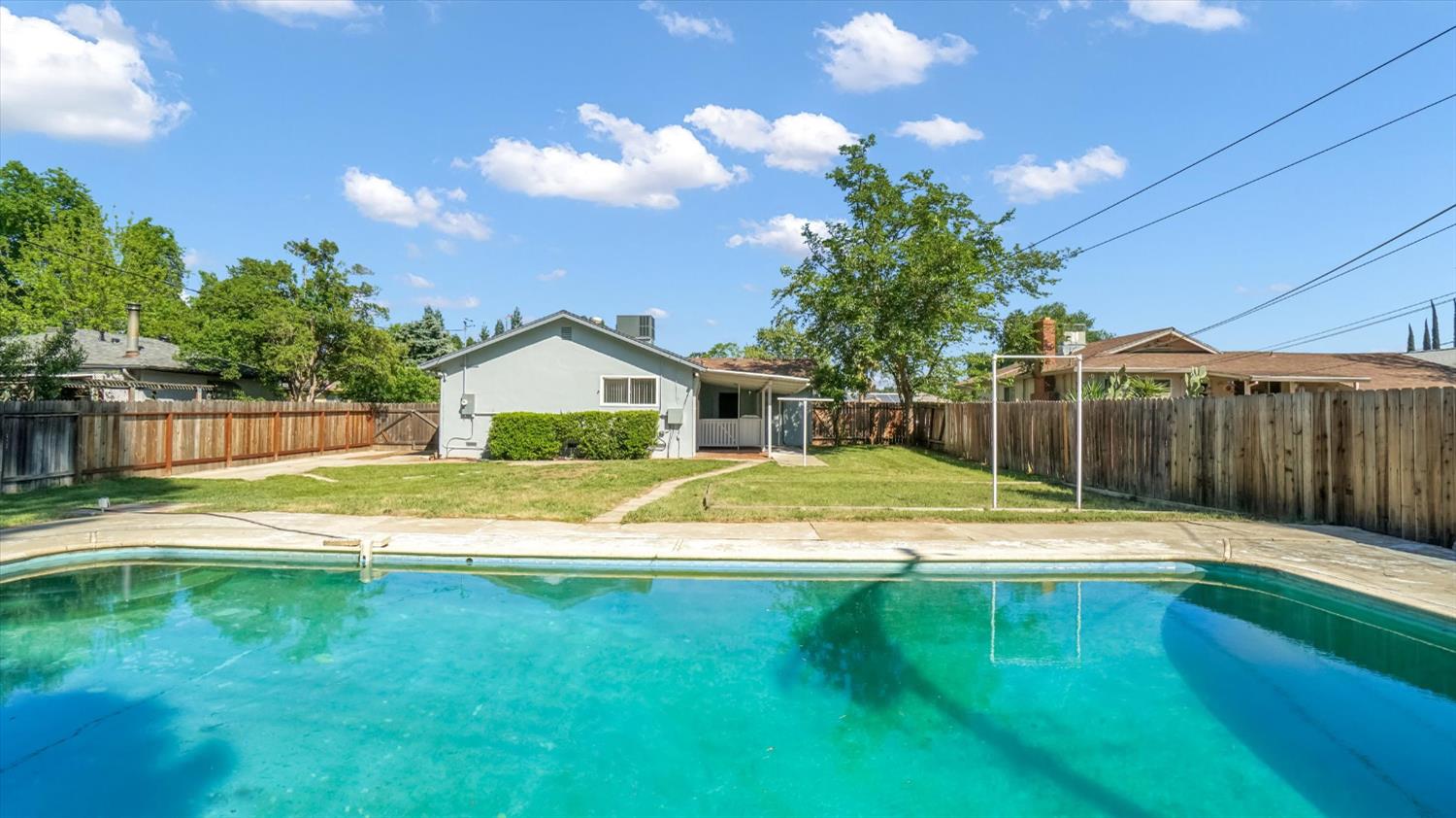 3543 Tarro Way Carmichael, CA 95608 - Photo 32 of 42 a view of pool with wooden fence