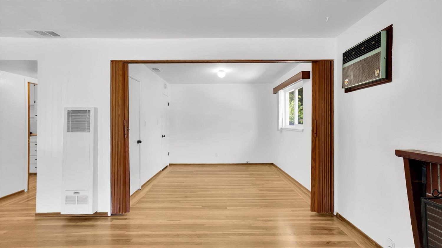 3543 Tarro Way Carmichael, CA 95608 - Photo 7 of 42 a view of a hallway with wooden floor and closet