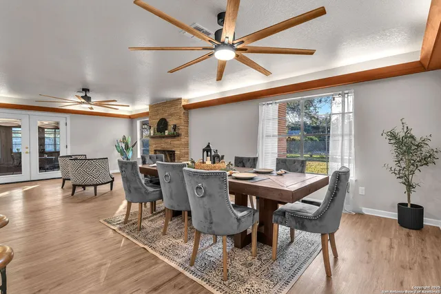 a bathroom with a toilet sink and shower