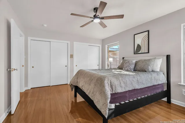a en suite bathroom with a sink a mirror and shower