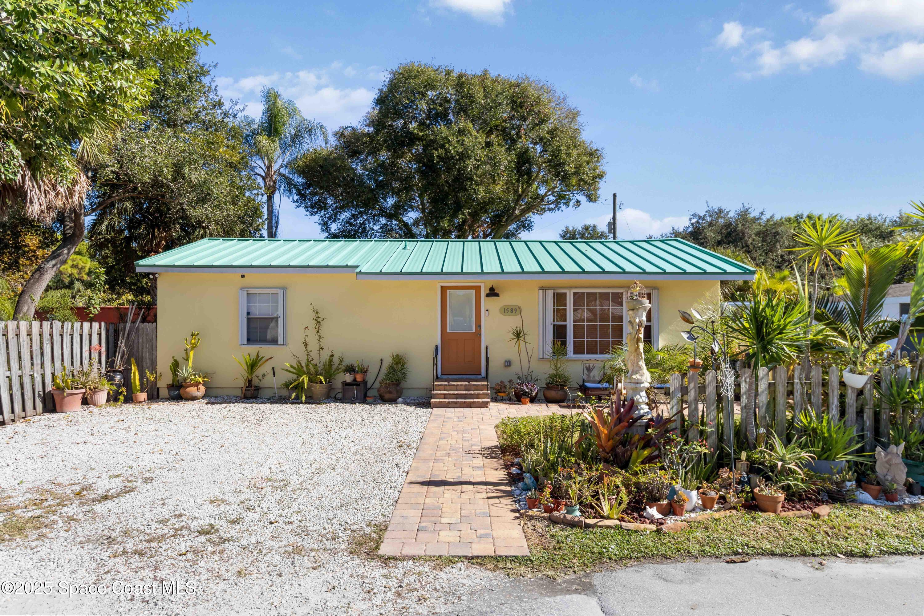 front view of a house with a patio