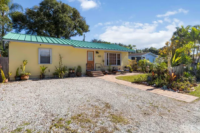 a view of a house with a patio