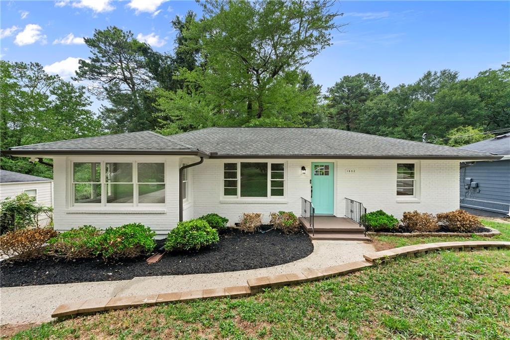 1902 Donna Place Decatur, GA 30032 - Photo 1 of 1 front view of a house with a yard
