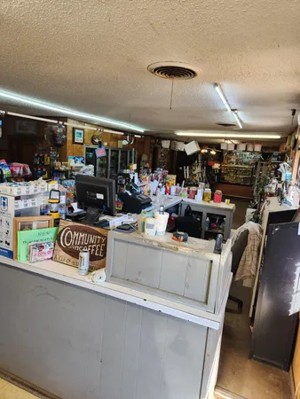 a room with lots of wooden furniture and lots of people