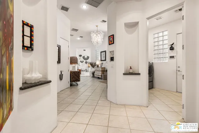 a bathroom with a tub a rug and a shower