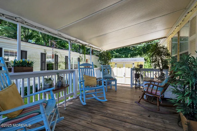 a view of a chairs on the deck