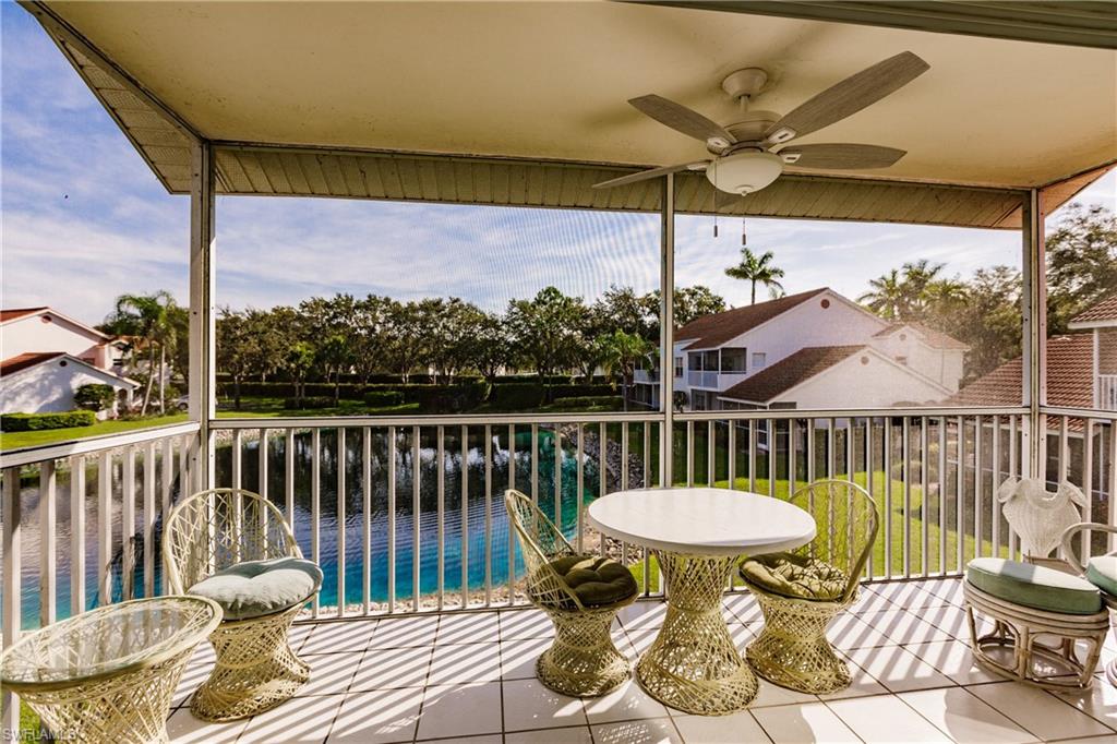 570 Windsor Square, Unit 202 Naples, FL 34104 - Photo 4 of 24 a balcony view with a seating space