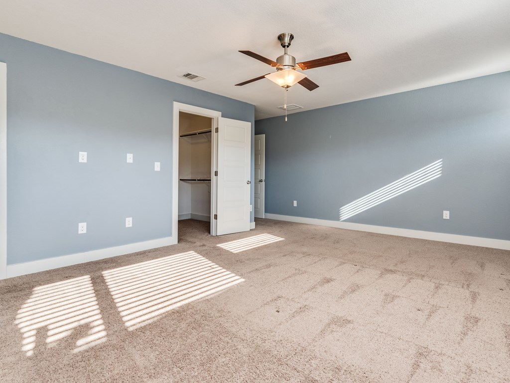 2208 Capulet Street Austin, TX 78741 - Photo 13 of 23 a view of a room with a ceiling fan and window