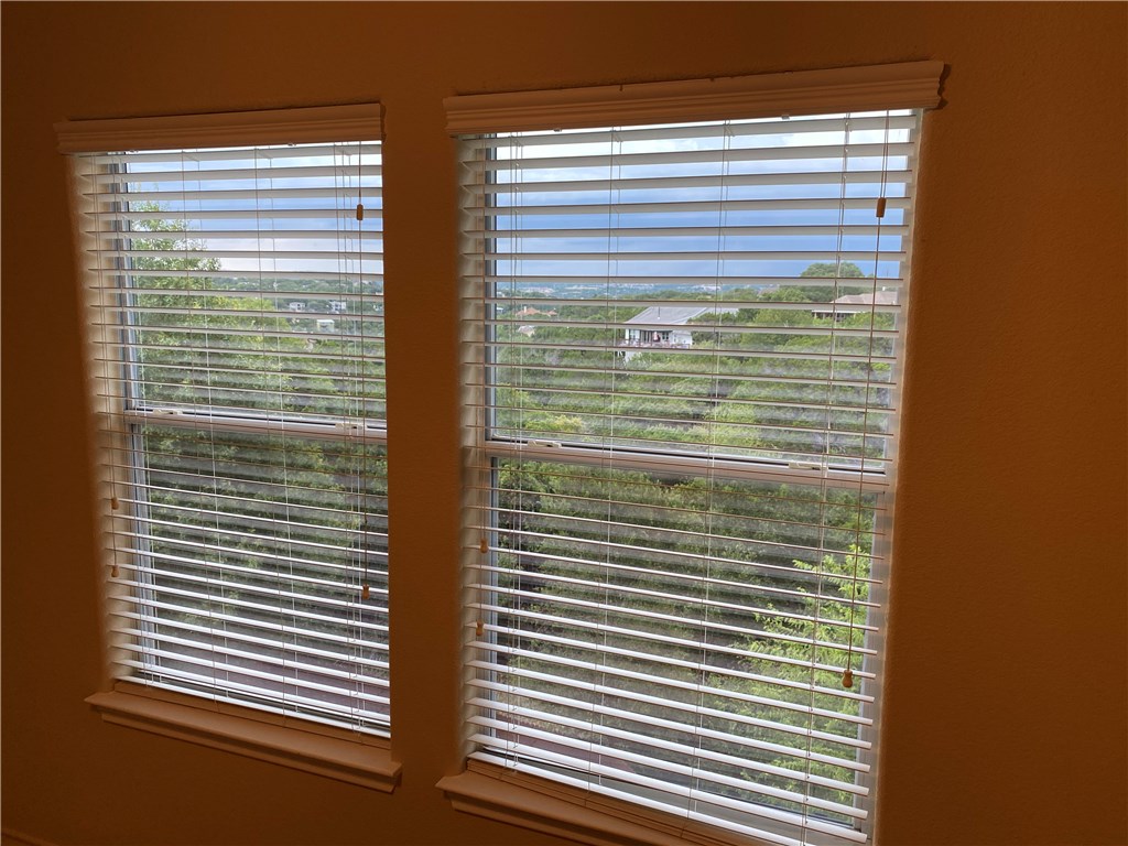2670 Crazyhorse Pass Austin, TX 78734 - Photo 20 of 27 a view of a balcony next to a window