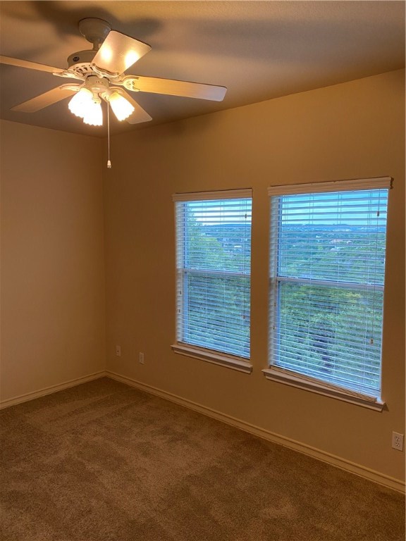 2670 Crazyhorse Pass Austin, TX 78734 - Photo 21 of 27 a view of an empty room with a window