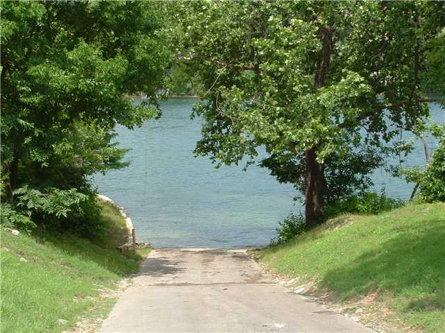 2670 Crazyhorse Pass Austin, TX 78734 - Photo 27 of 27 a view of a pathway both side of yard