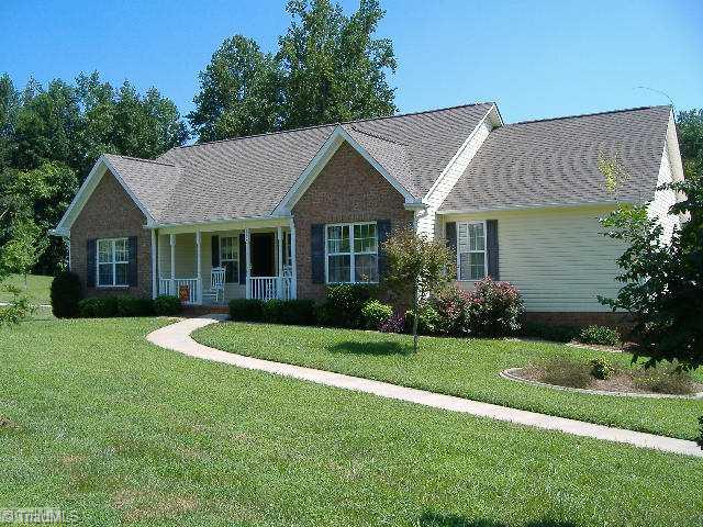 110 Hagen Road Advance, NC 27006 - Photo 16 of 16 Exterior Front. One level living on over one acre in great neighborhood. This home is beautifully decorated and well maintained. Must see to appreciate the great floor plan. Full basement for future expansion.