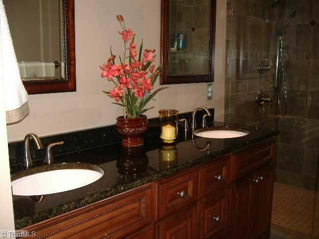 110 Hagen Road Advance, NC 27006 - Photo 10 of 16 Master Bath/Spa. Wow is the best way to describe the Master Bath. Completely remodeled. Featuring Double Vanity, Granite Counter Top, New ceramic tile floors and huge ceramic shower.-----another must see.
