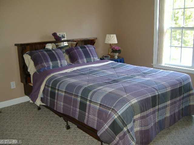110 Hagen Road Advance, NC 27006 - Photo 12 of 16 2nd Bedroom. The 2nd Bedroom and the 3rd are basically identical in size.