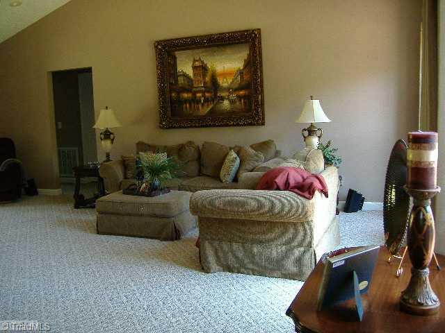 110 Hagen Road Advance, NC 27006 - Photo 3 of 16 Den/Family/Great Room. The Cathedral Ceiling gives a very spacious feel to this room. Just a few steps to the Deck and the Kitchen.