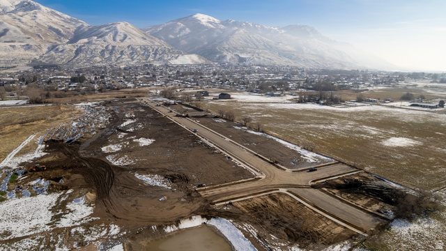 1380 West 2350 South, Unit 16 Perry, UT 84302 - Photo 23 of 25 Snowy aerial view with a mountain view
