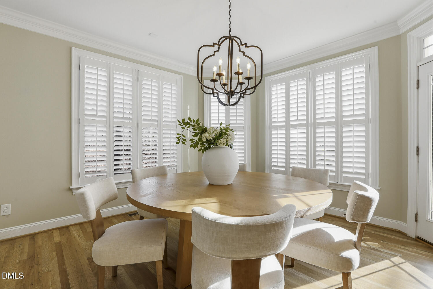 3124 Briar Stream Run Raleigh, NC 27612 - Photo 16 of 57 a view of a dining room with furniture window and wooden floor
