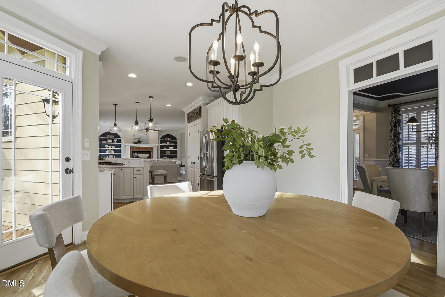 3124 Briar Stream Run Raleigh, NC 27612 - Photo 18 of 57 a view of a dining room with furniture and wooden floor