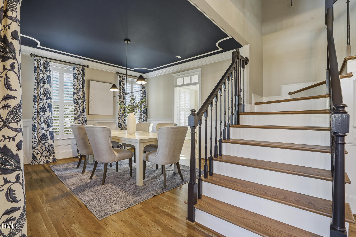 3124 Briar Stream Run Raleigh, NC 27612 - Photo 23 of 57 a view of a dining room with furniture window and wooden floor