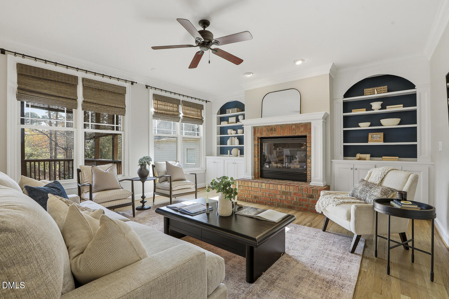 3124 Briar Stream Run Raleigh, NC 27612 - Photo 24 of 57 a living room with fireplace furniture and a large window