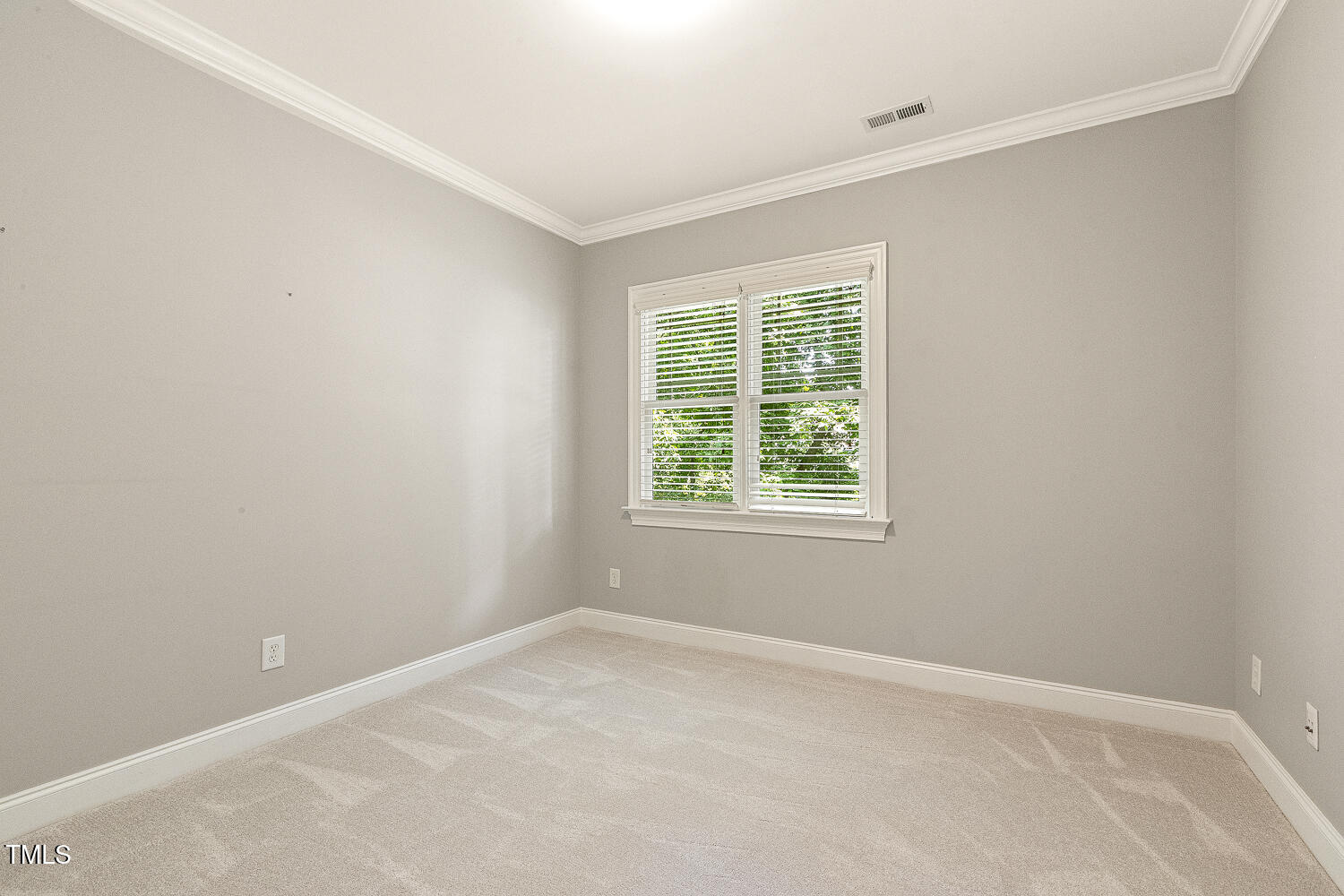 3124 Briar Stream Run Raleigh, NC 27612 - Photo 41 of 57 an empty room with a window