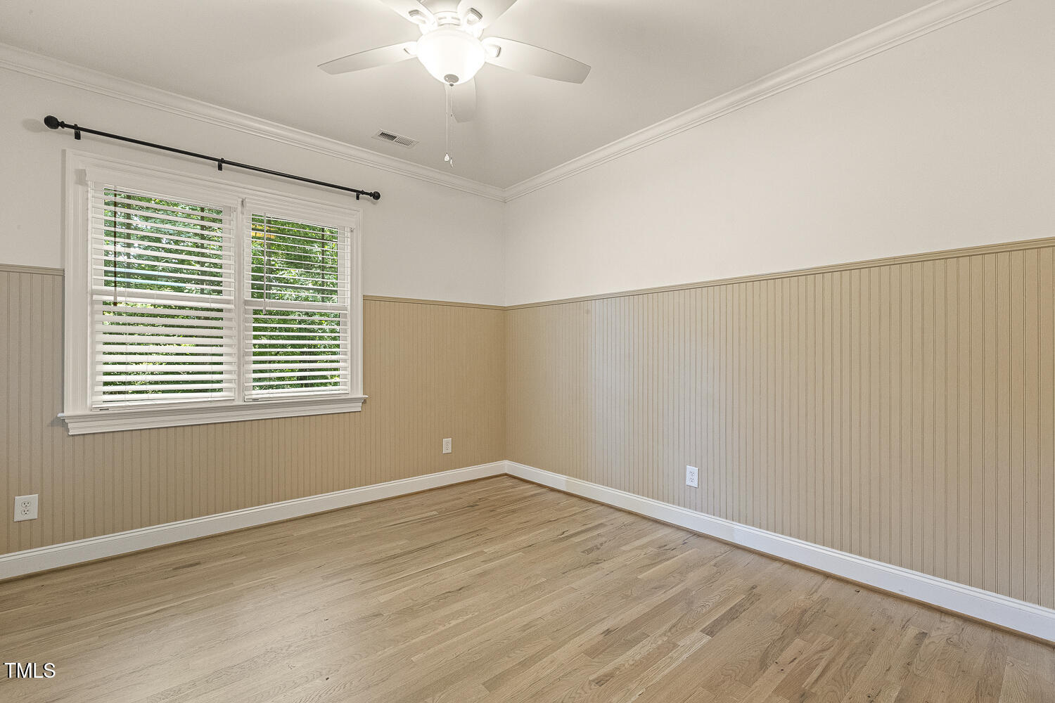 3124 Briar Stream Run Raleigh, NC 27612 - Photo 44 of 57 a view of an empty room with wooden floor and a window