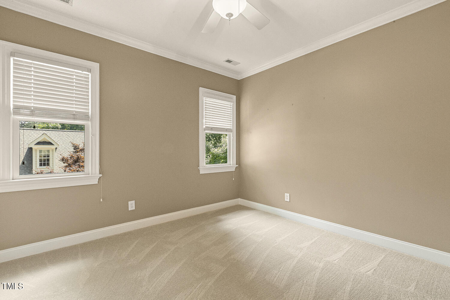 3124 Briar Stream Run Raleigh, NC 27612 - Photo 46 of 57 a view of an empty room with a window