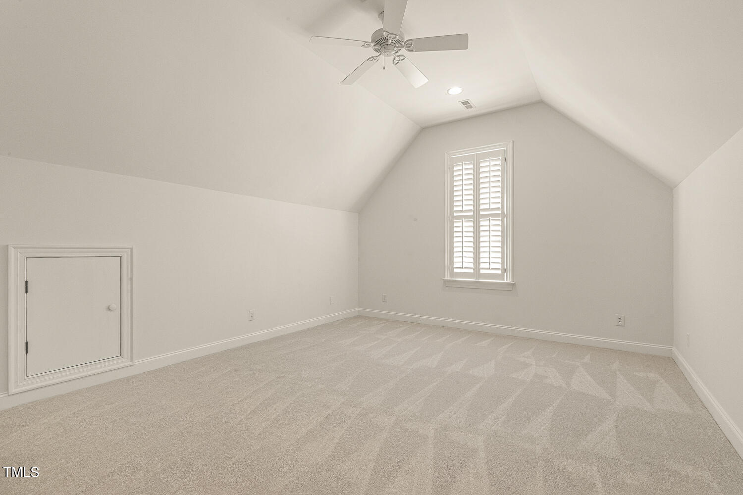 3124 Briar Stream Run Raleigh, NC 27612 - Photo 49 of 57 an empty room with windows and fan