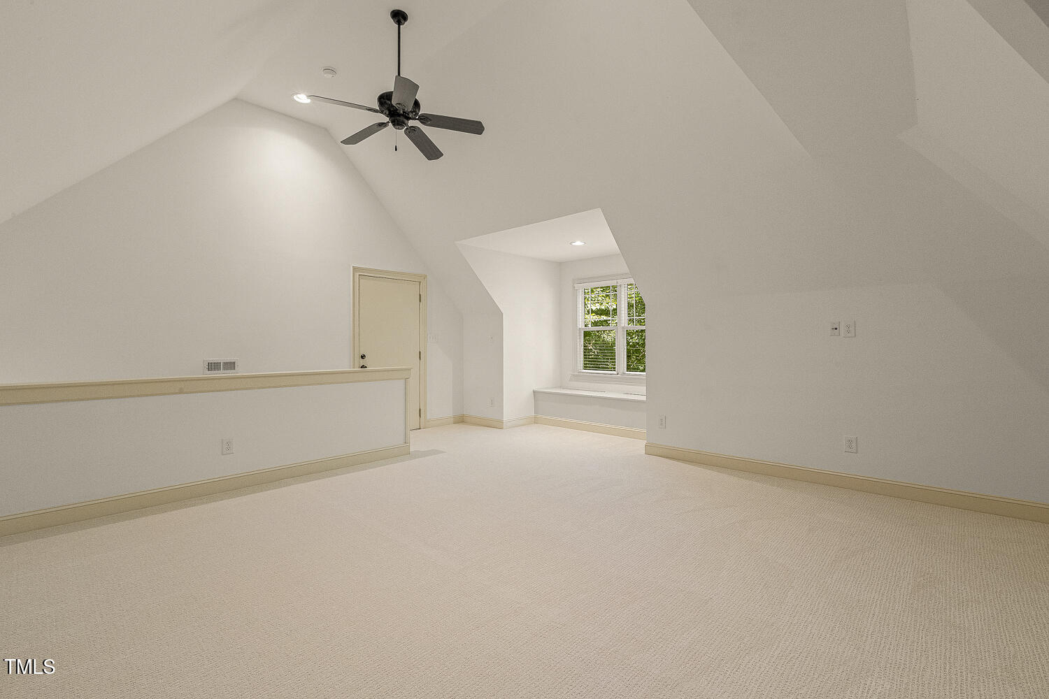 3124 Briar Stream Run Raleigh, NC 27612 - Photo 52 of 57 an empty room with a window and a ceiling fan