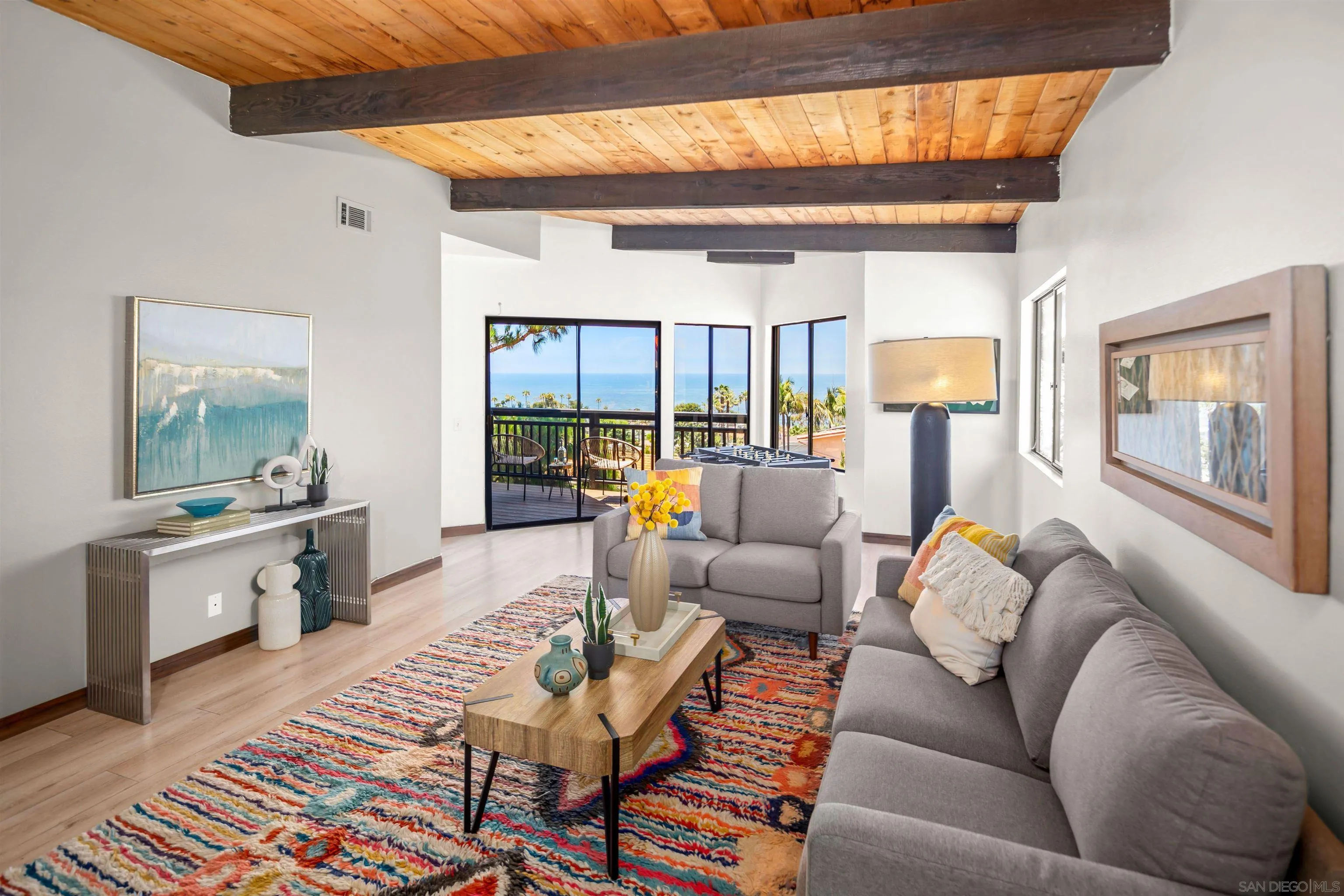 1005 Cornish Drive San Diego, CA 92107 - Photo 26 of 71 a living room with furniture and a wooden floor