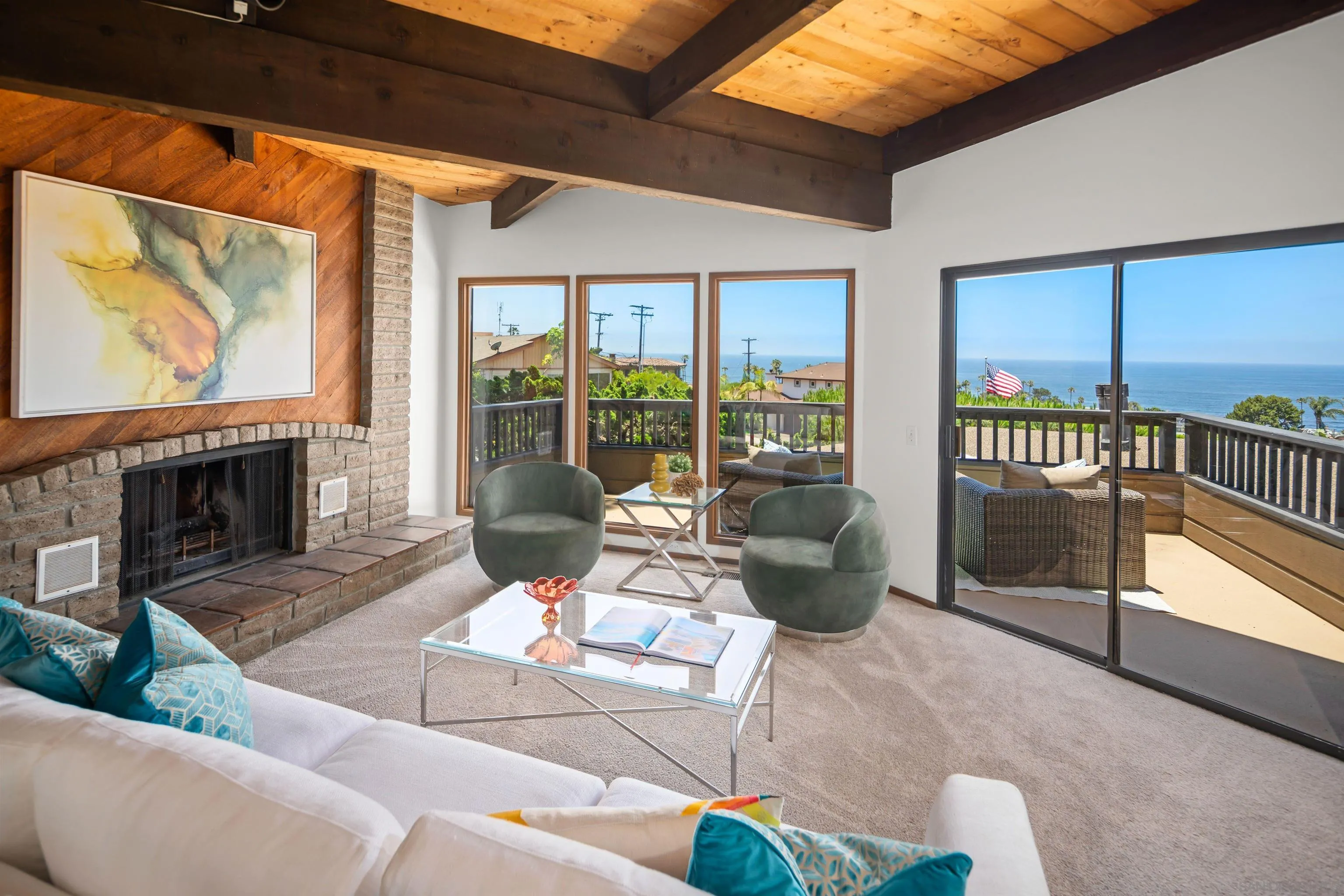 1005 Cornish Drive San Diego, CA 92107 - Photo 3 of 71 a living room with furniture and a fireplace