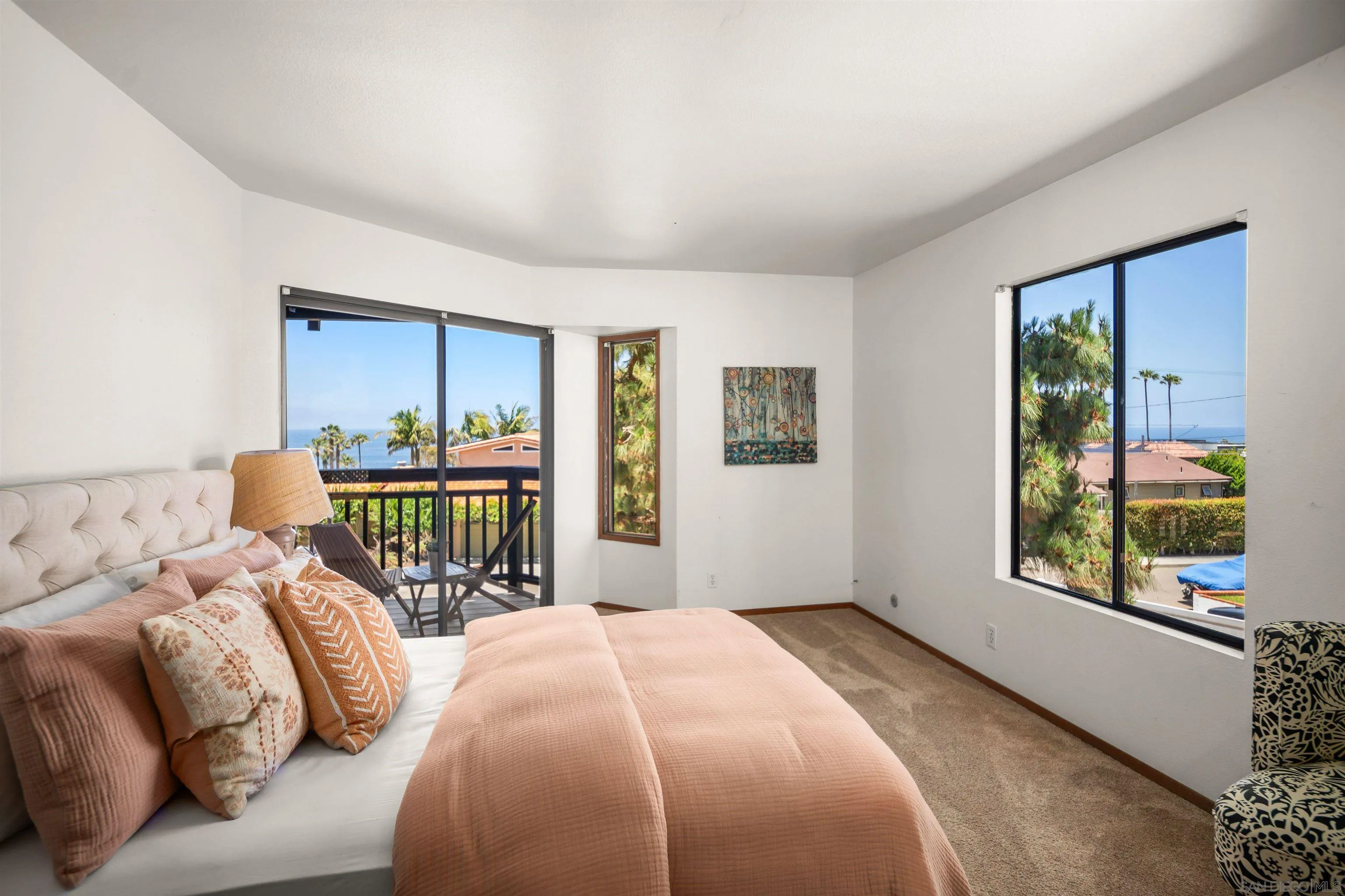 1005 Cornish Drive San Diego, CA 92107 - Photo 33 of 71 a bedroom with a bed and a table