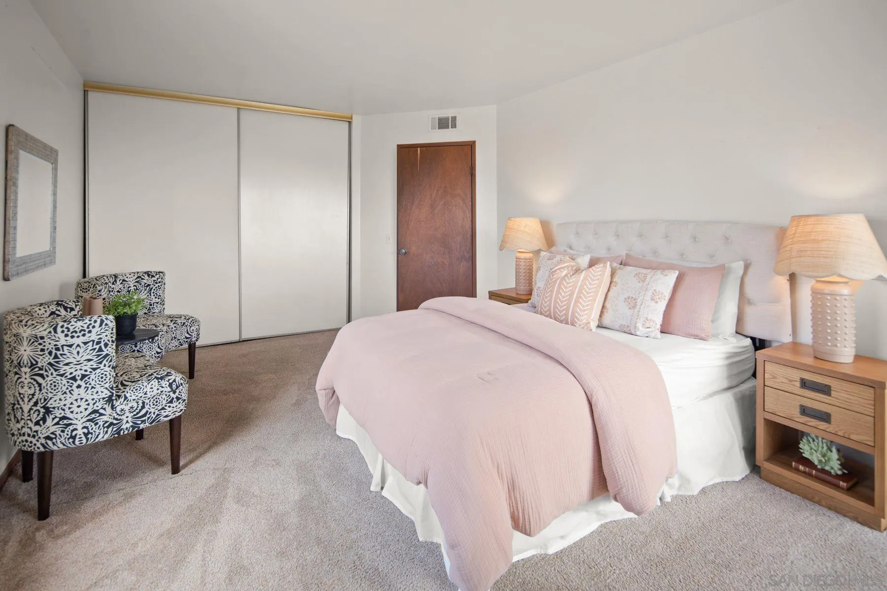 1005 Cornish Drive San Diego, CA 92107 - Photo 35 of 71 a bedroom with a bed and a couch