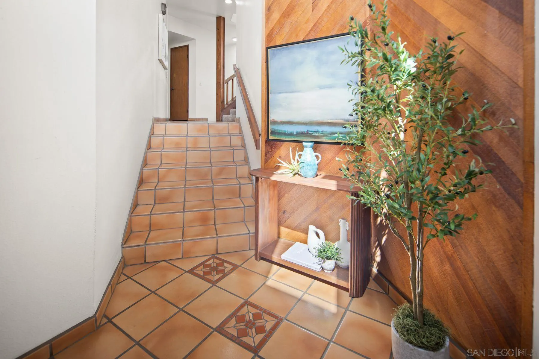 1005 Cornish Drive San Diego, CA 92107 - Photo 47 of 71 a view of an entryway with a tree
