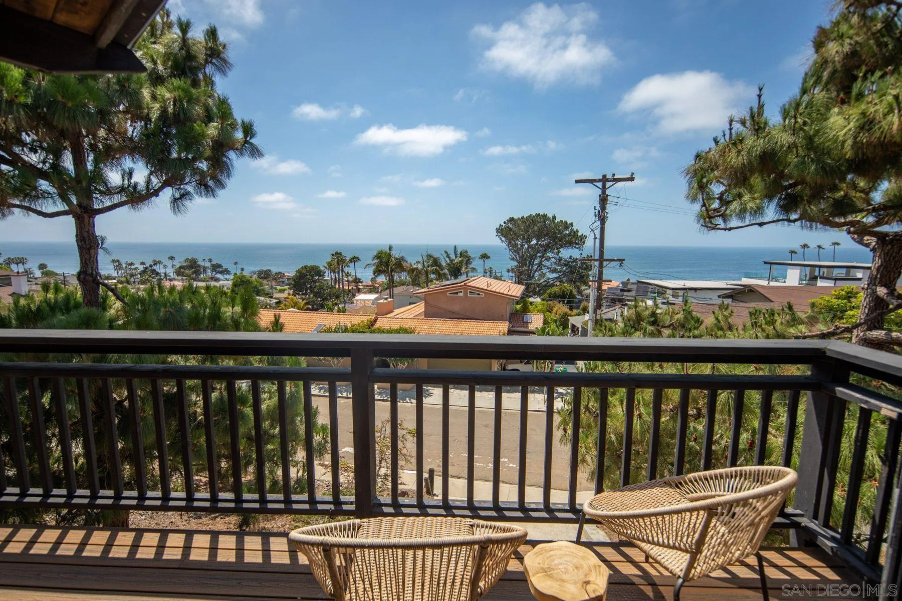 1005 Cornish Drive San Diego, CA 92107 - Photo 56 of 71 a view of a balcony with wooden floor