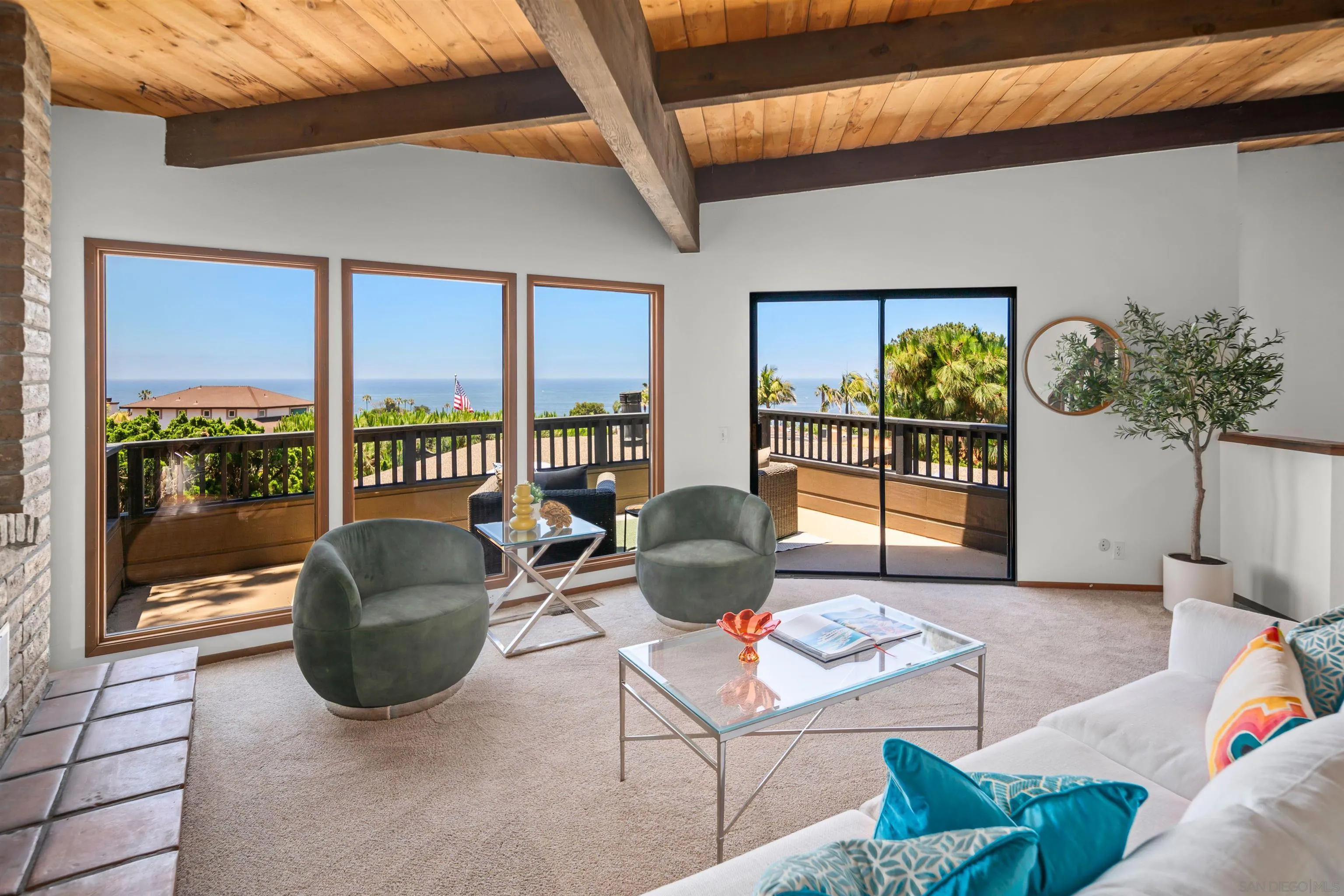 1005 Cornish Drive San Diego, CA 92107 - Photo 6 of 71 a living room with furniture a floor to ceiling window and potted plant