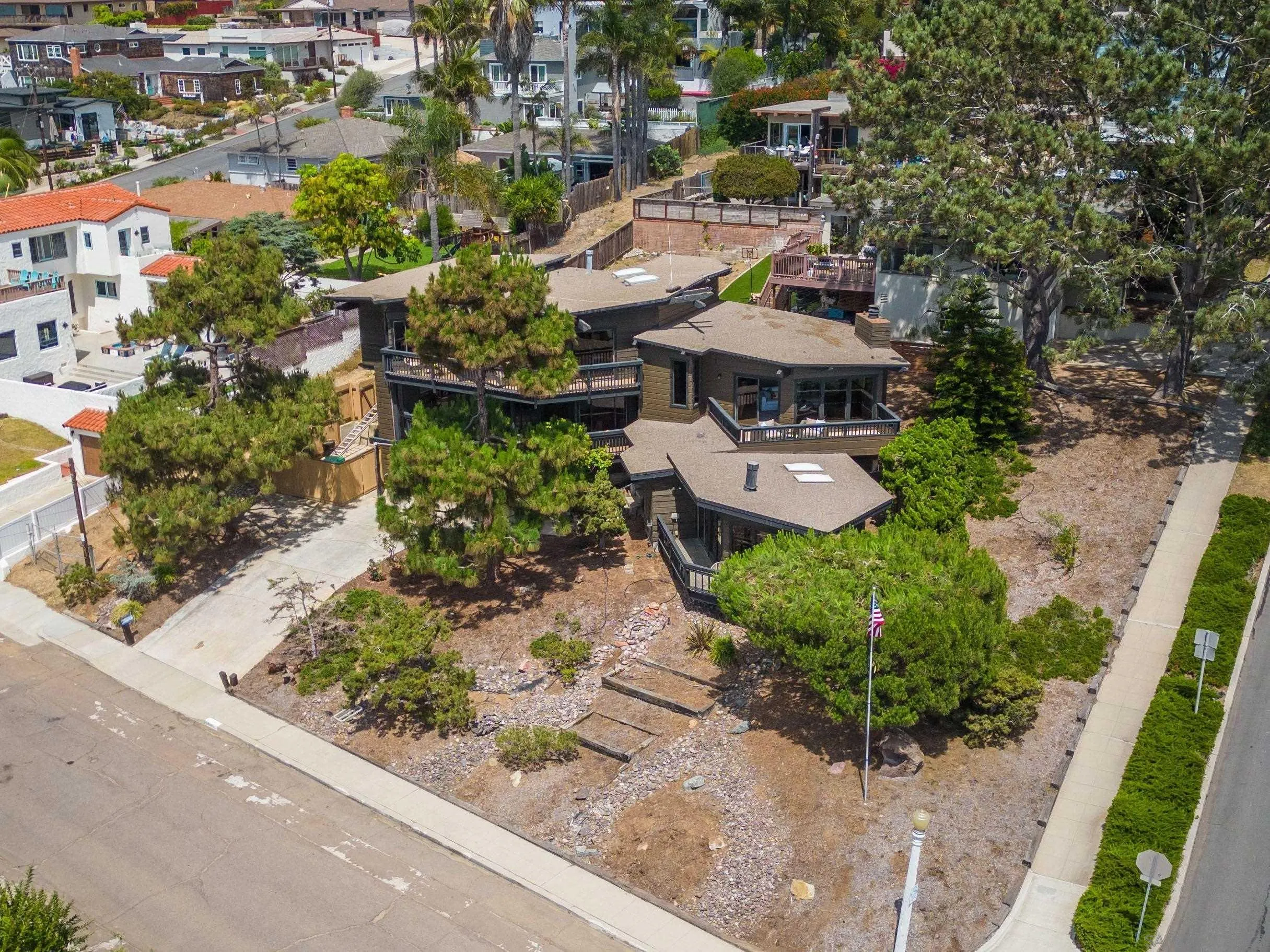 1005 Cornish Drive San Diego, CA 92107 - Photo 63 of 71 an aerial view of a house with a yard and garden