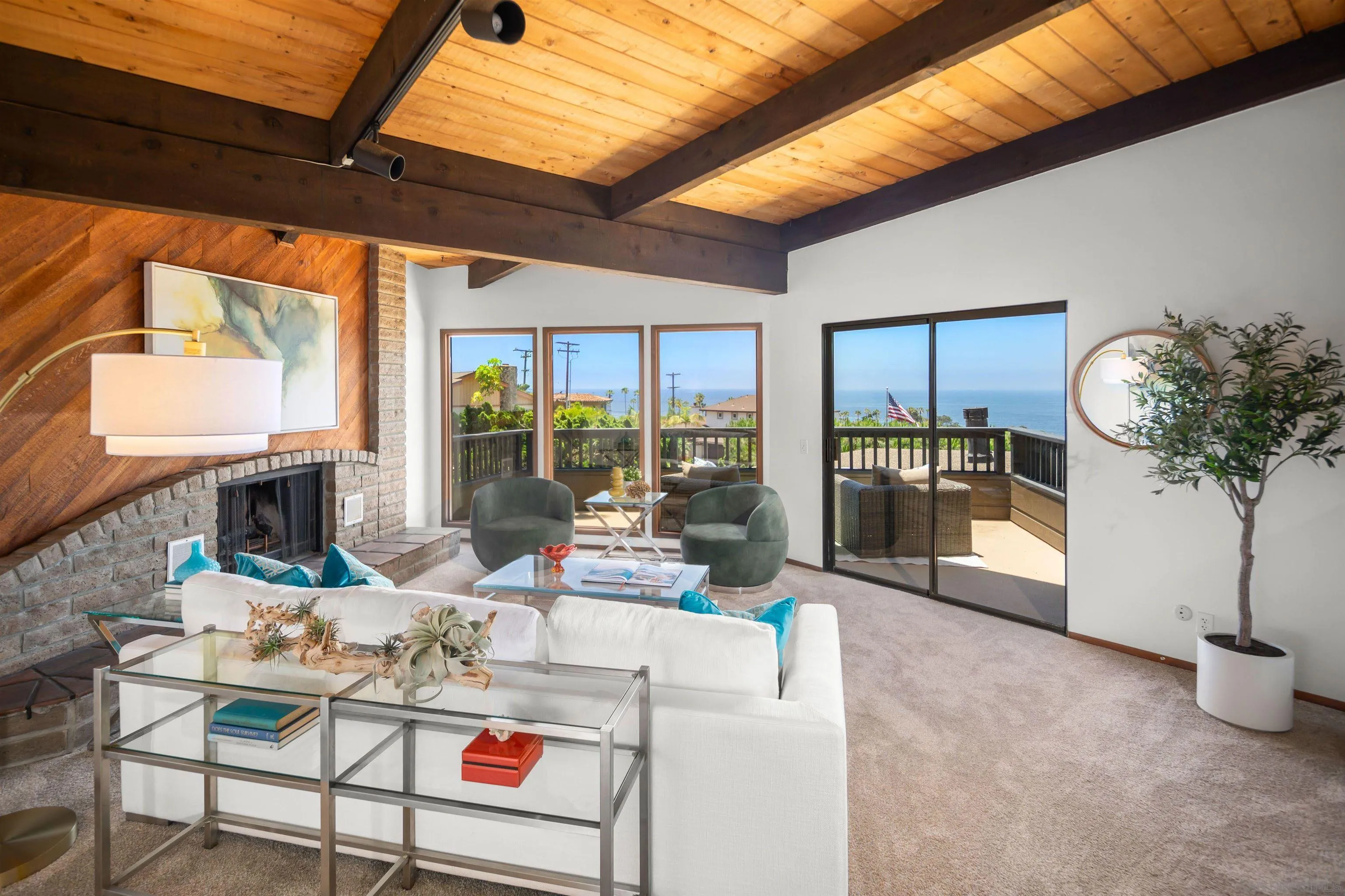 1005 Cornish Drive San Diego, CA 92107 - Photo 7 of 71 a living room with fireplace furniture and a large window