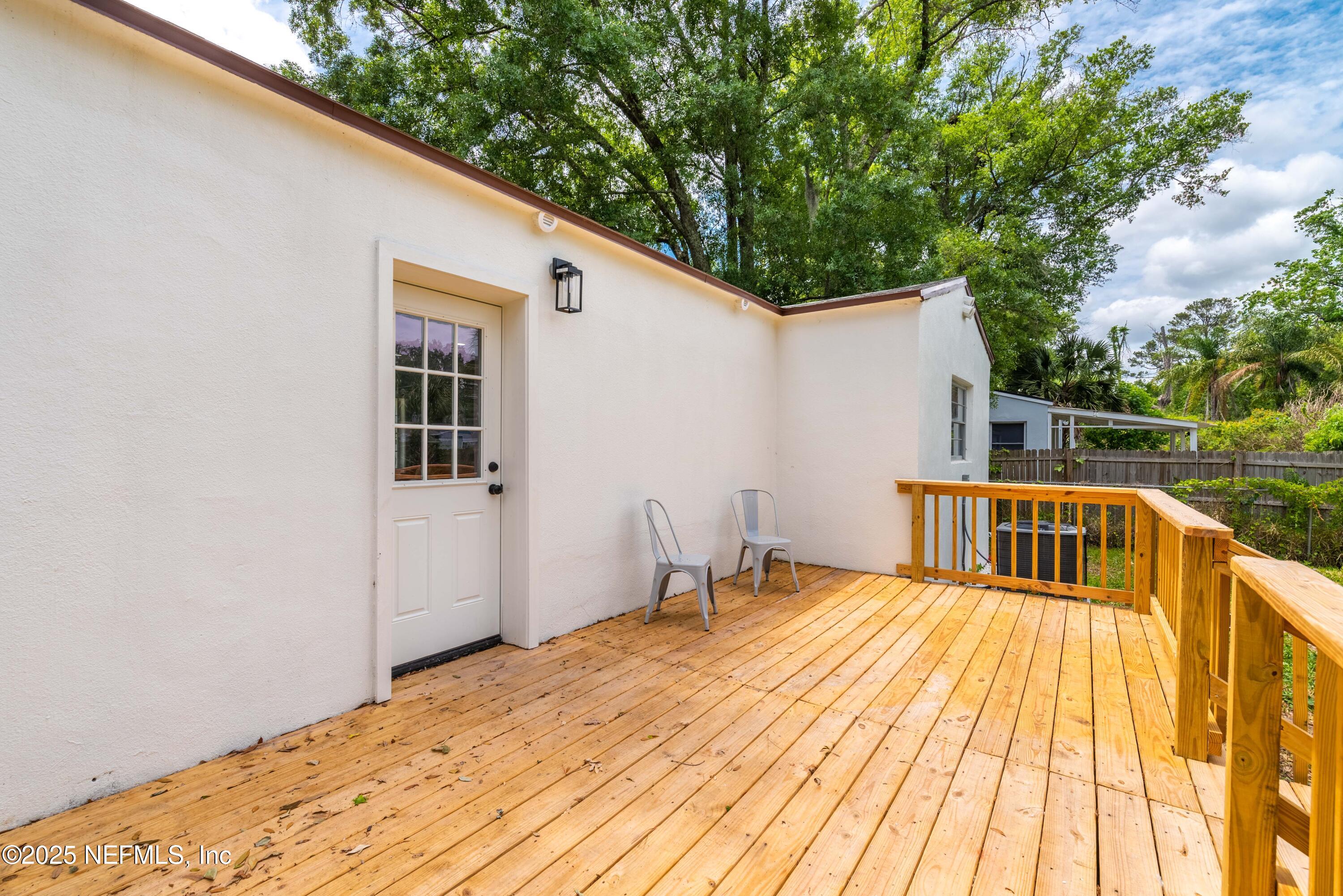4647 Timuquana Road Jacksonville, FL 32210 - Photo 23 of 27 a view of deck with patio