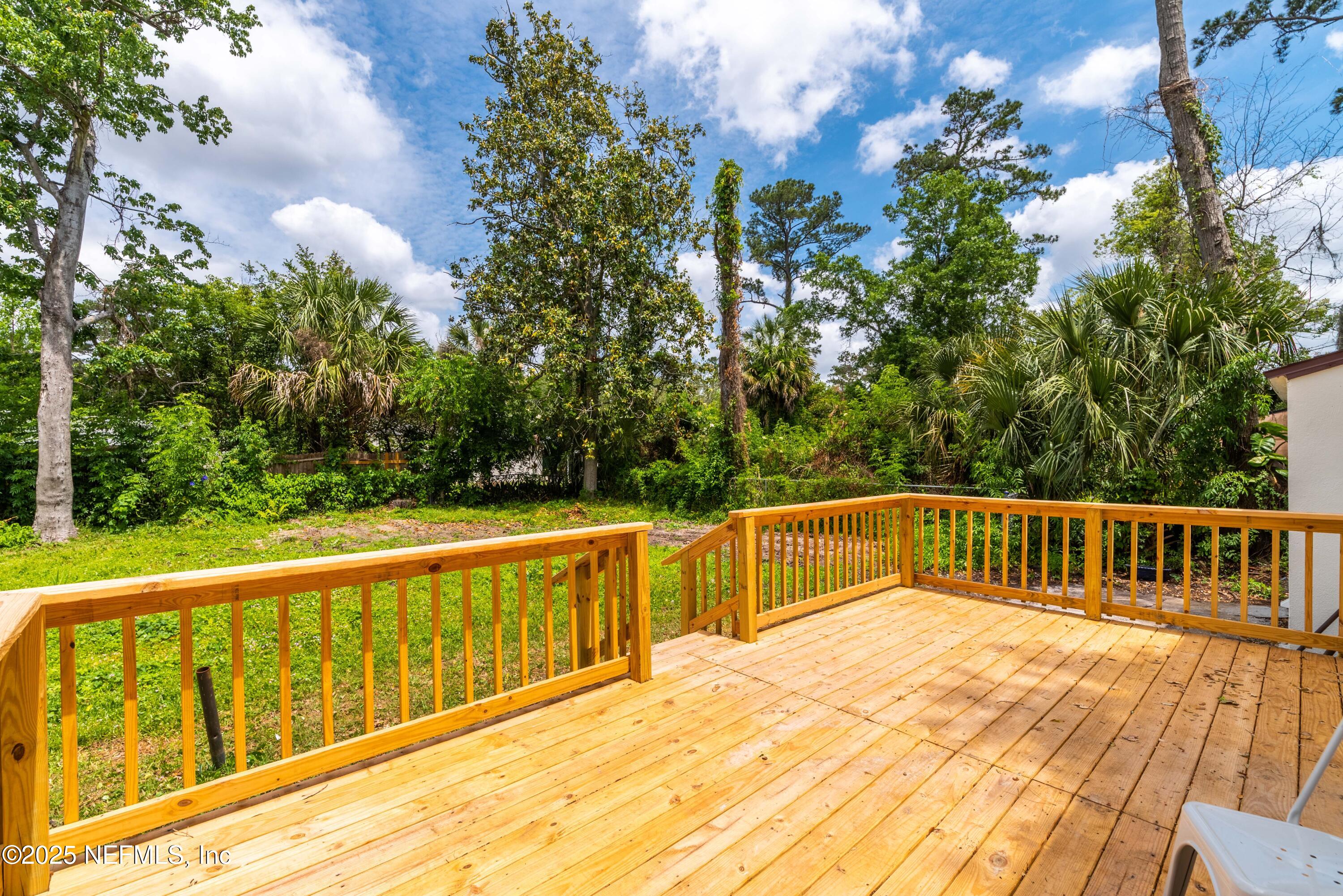 4647 Timuquana Road Jacksonville, FL 32210 - Photo 24 of 27 a view of balcony with wooden floor and fence