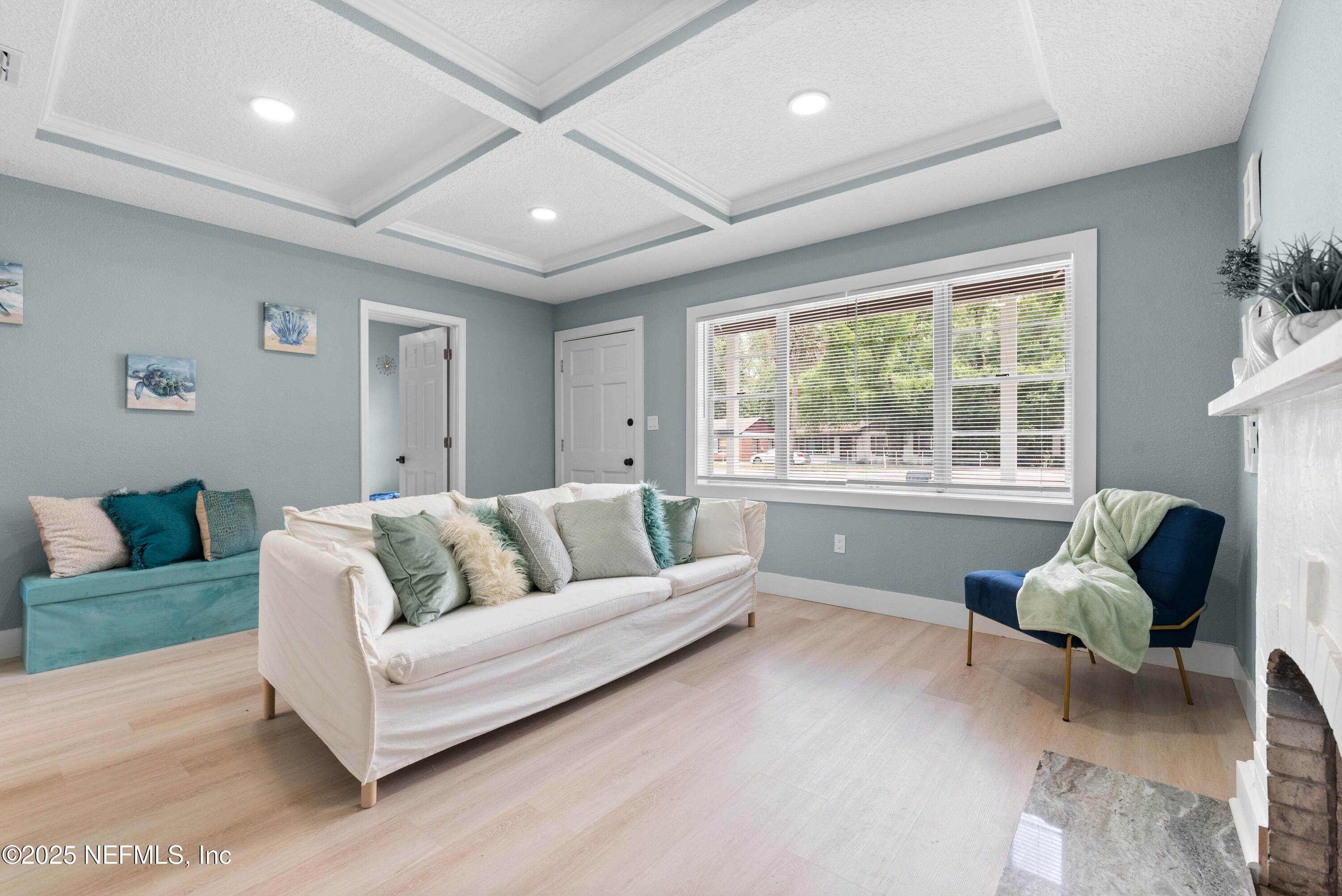 4647 Timuquana Road Jacksonville, FL 32210 - Photo 8 of 27 a living room with furniture and a large window
